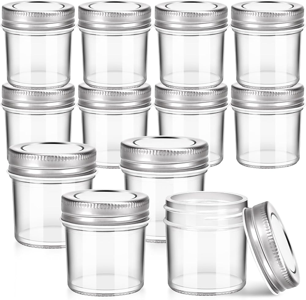 Small clear glass jars with screw-on lids for herbs and extracts