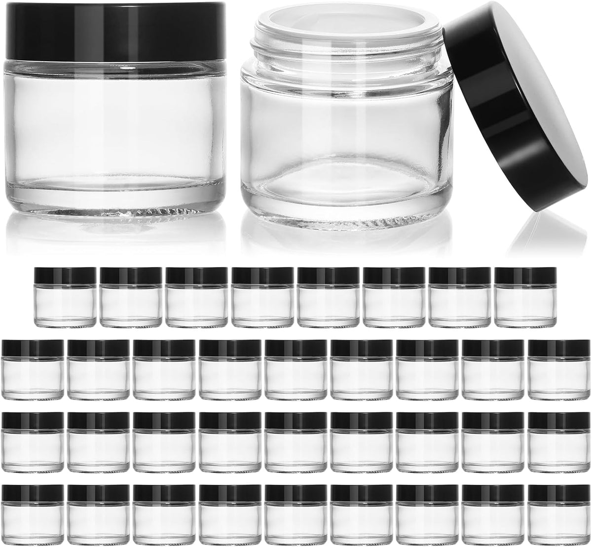 Clear 2 oz glass jars with black screw-on lids and inner liners