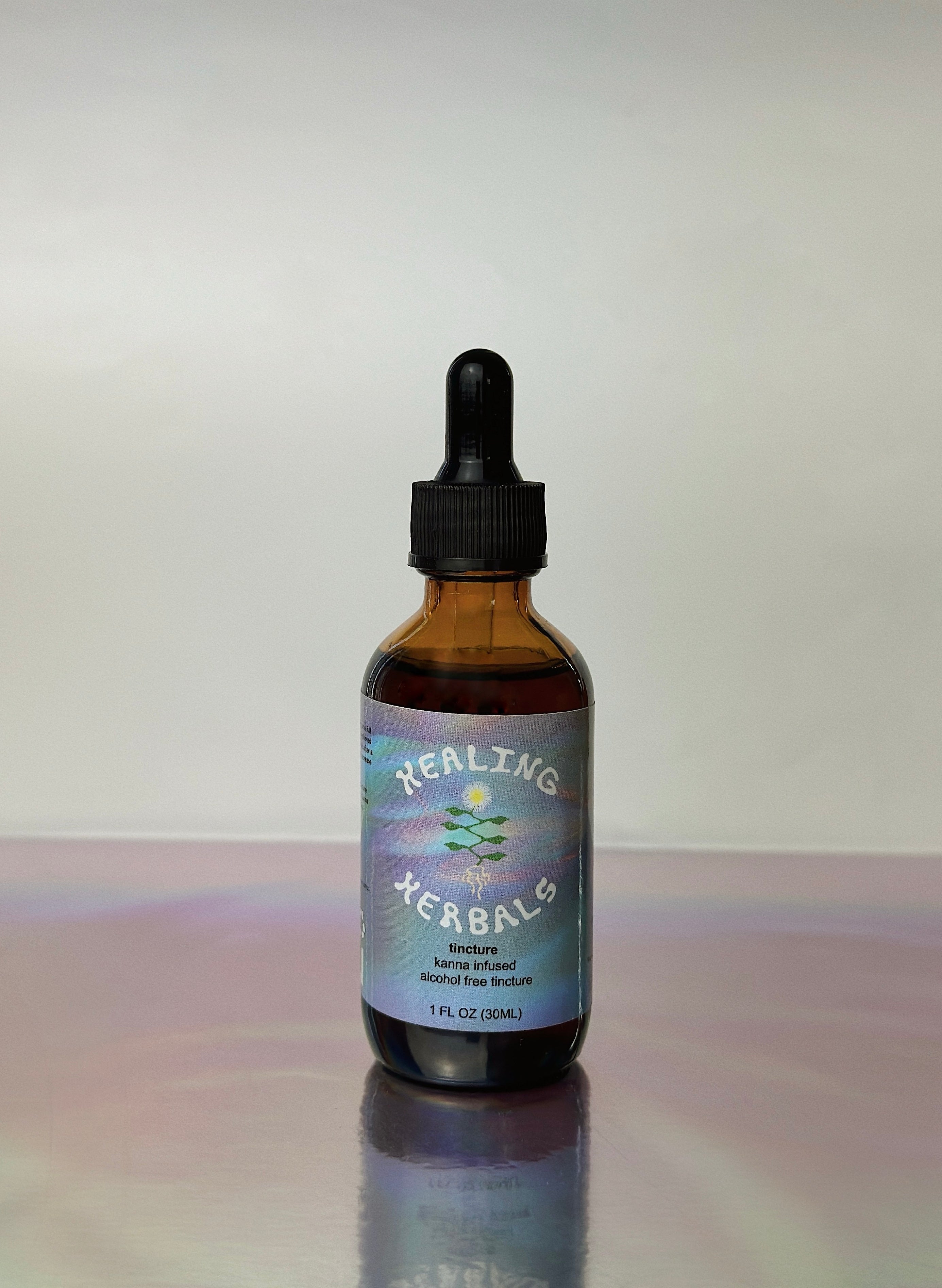 Healing Herbals full-spectrum kanna tincture, alcohol-free formula in an amber glass dropper bottle (1 fl oz / 30 ml), displayed upright on a reflective surface against a clean neutral background.