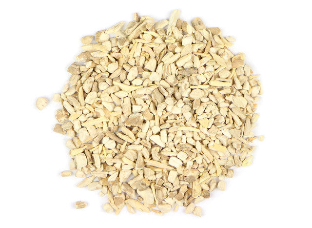 Top-down view of organic dried ashwagandha root by Healing Herbals, showing small chopped beige root pieces with a natural, fibrous texture on a clean white background.