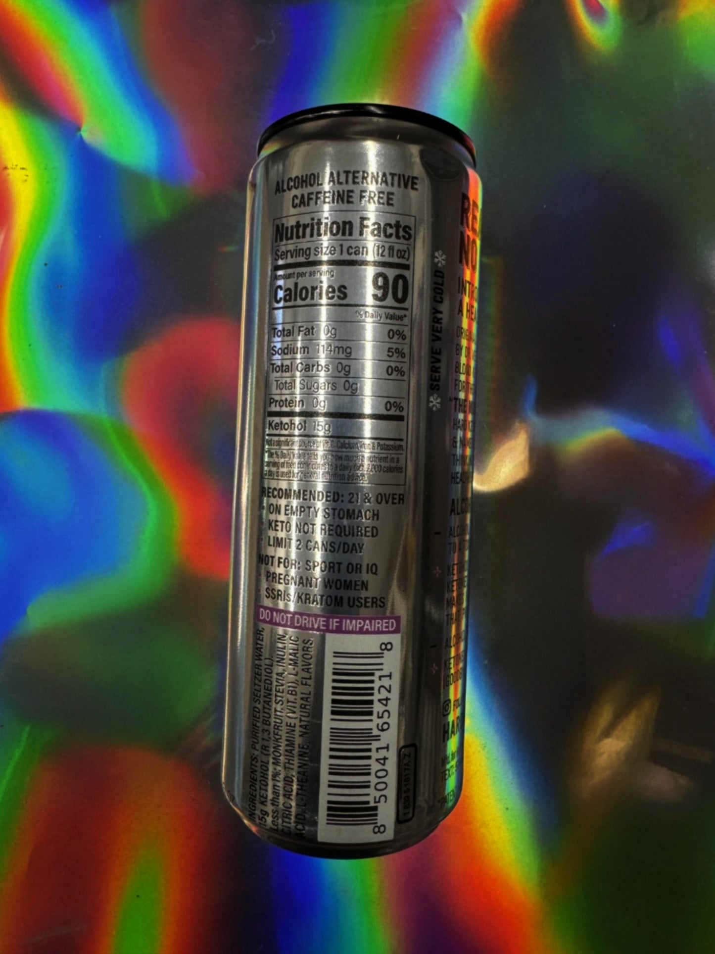 Back of Hard Ketones Piña Colada Seltzer can showing the nutrition facts panel and ingredient list, confirming 0 sugar, 0 carbs, and 15g Ketohol.