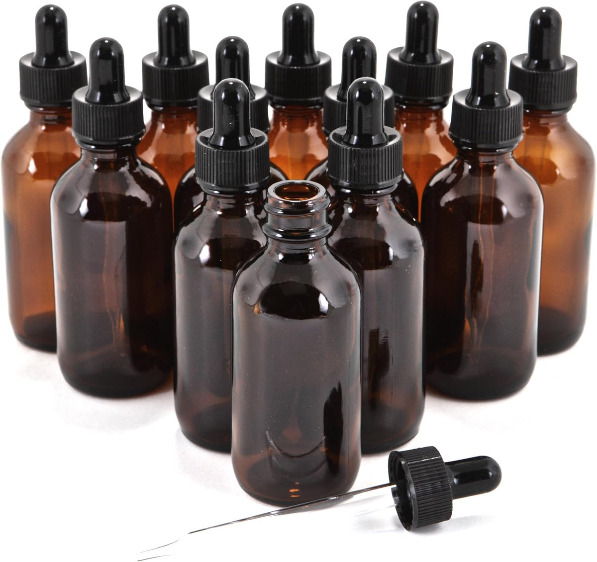Empty 2 oz amber glass tincture bottles with glass droppers