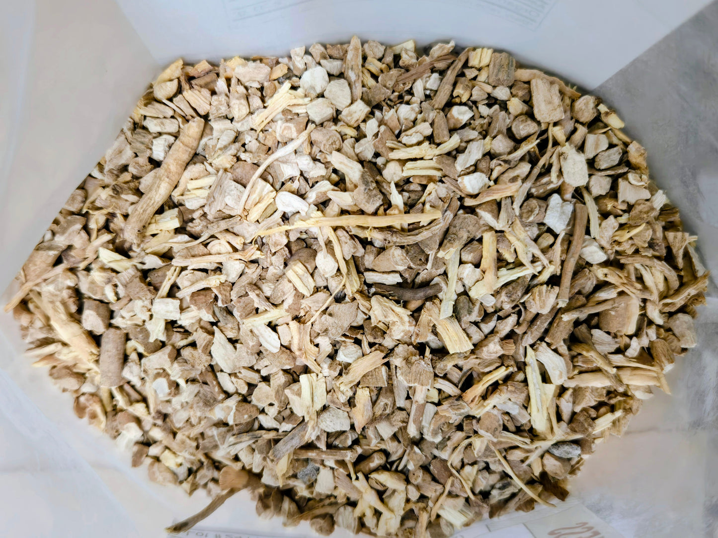 Dried Organic Ashwagandha Whole Root Display Neatly, Showing Their Natural Earthy Color And Rough Texture