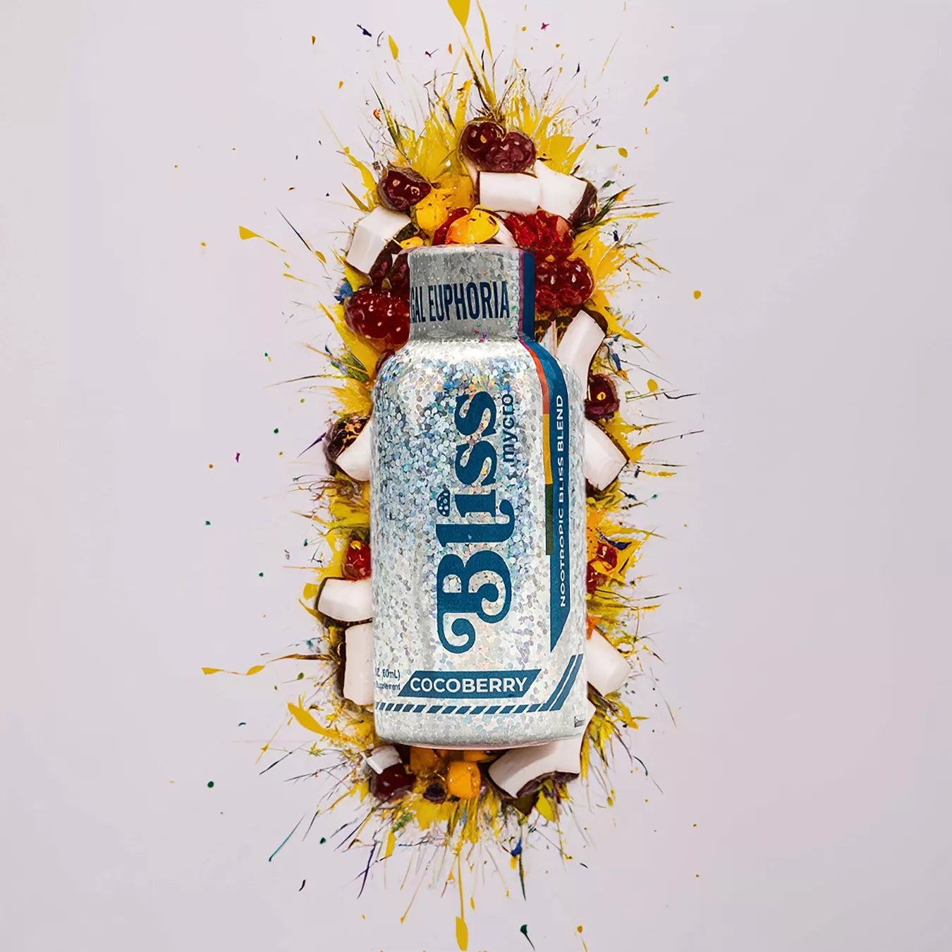 Bliss Cocoberry nootropic beverage bottle featuring a silver label, displayed with coconut chunks and berry pieces bursting outward on a clean background.