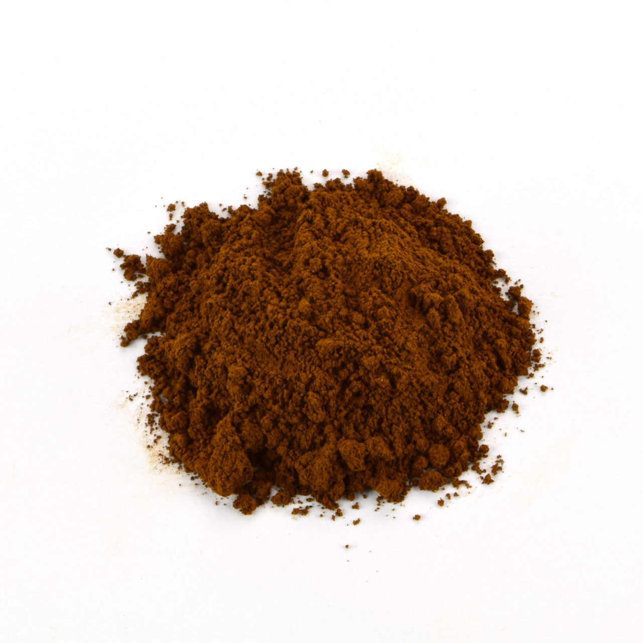 Chaga mushroom extract powder with rich brown color, finely ground botanical extract isolated on a white background.