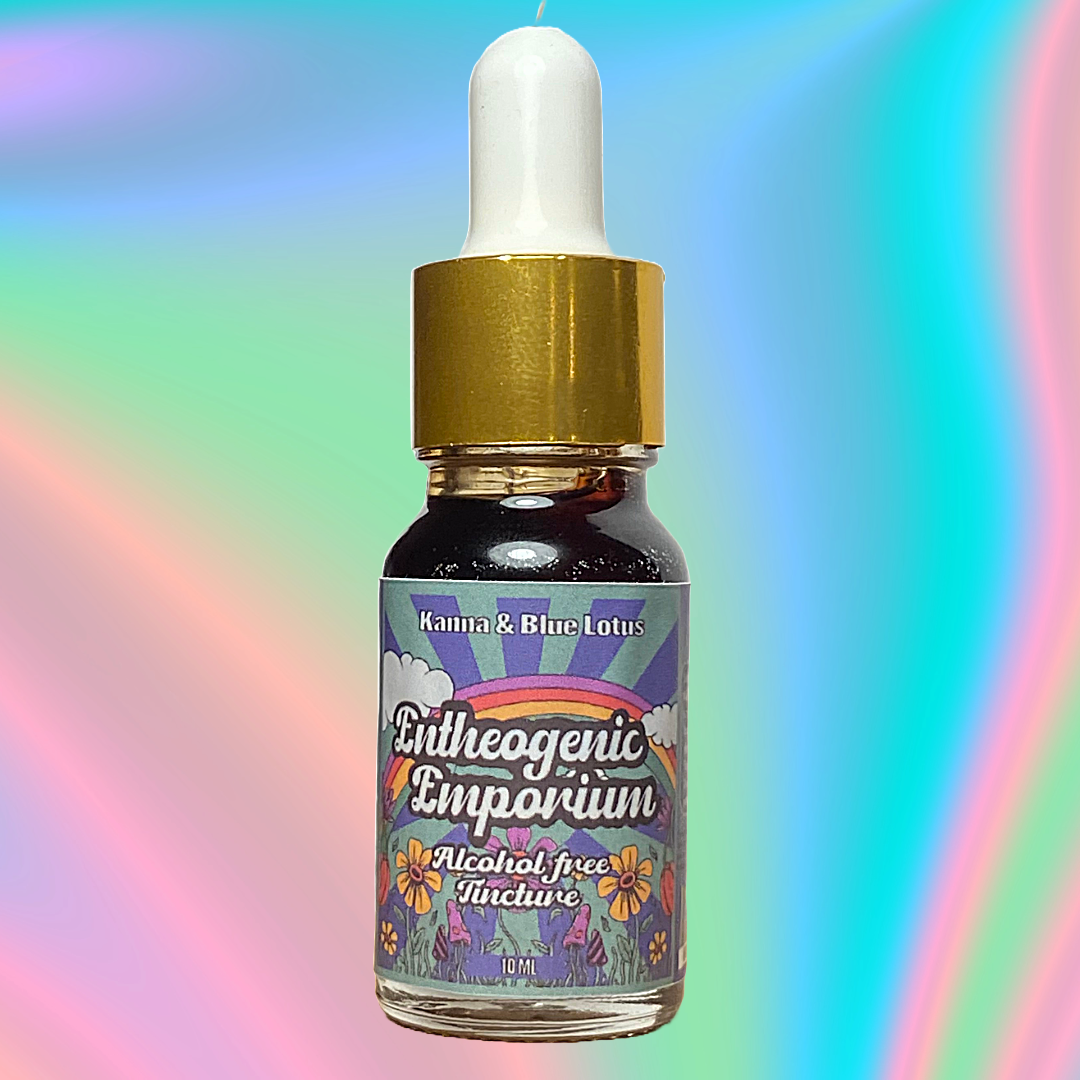 Kanna and Blue Lotus alcohol-free tincture in a 10 ml dark glass dropper bottle with a gold cap and white bulb, featuring colorful Entheogenic Emporium labeling, set against a soft pastel rainbow gradient background.